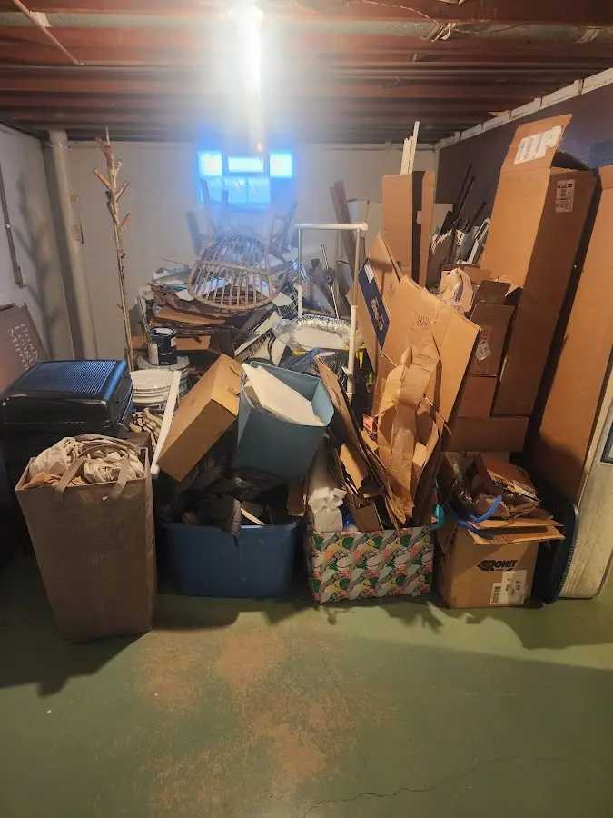 Roll-off dumpster container at job site for 2 Yard Dumpster Rental in Emmett